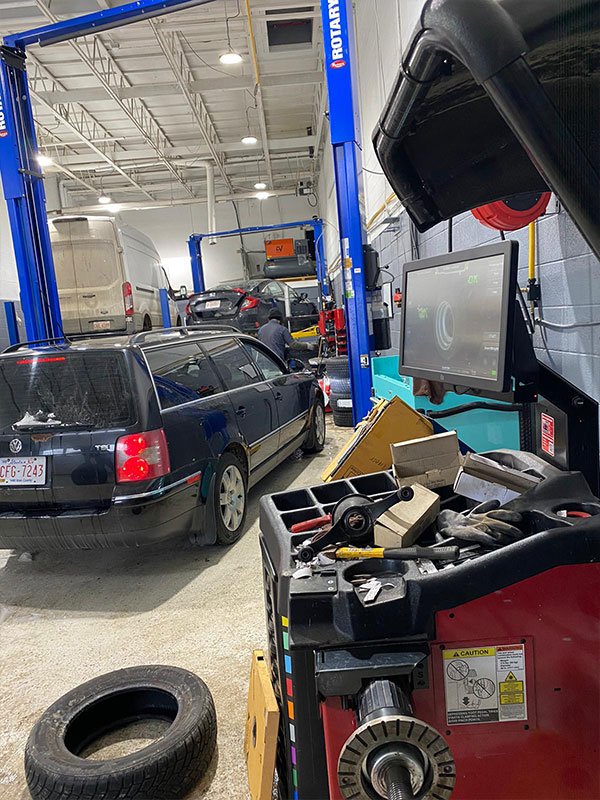 Performing diagnostic check at Robbie's Garage in NE Calgary.